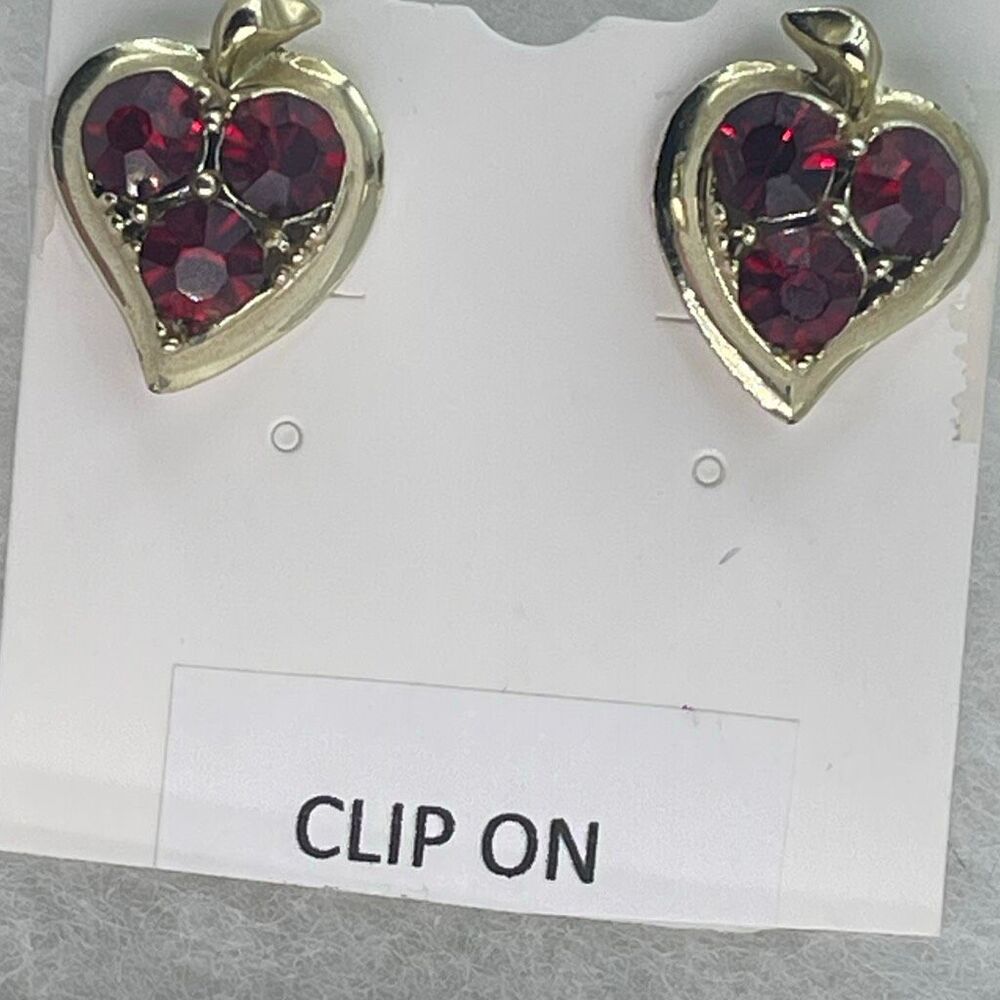 Vintage red cut glass heart shaped screwback earrings.